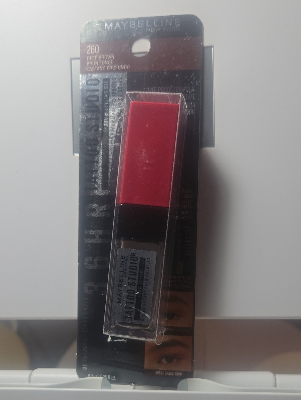 Maybelline Tattoo Studio Brow Product with Red Cap and Brown Base Styling Gel